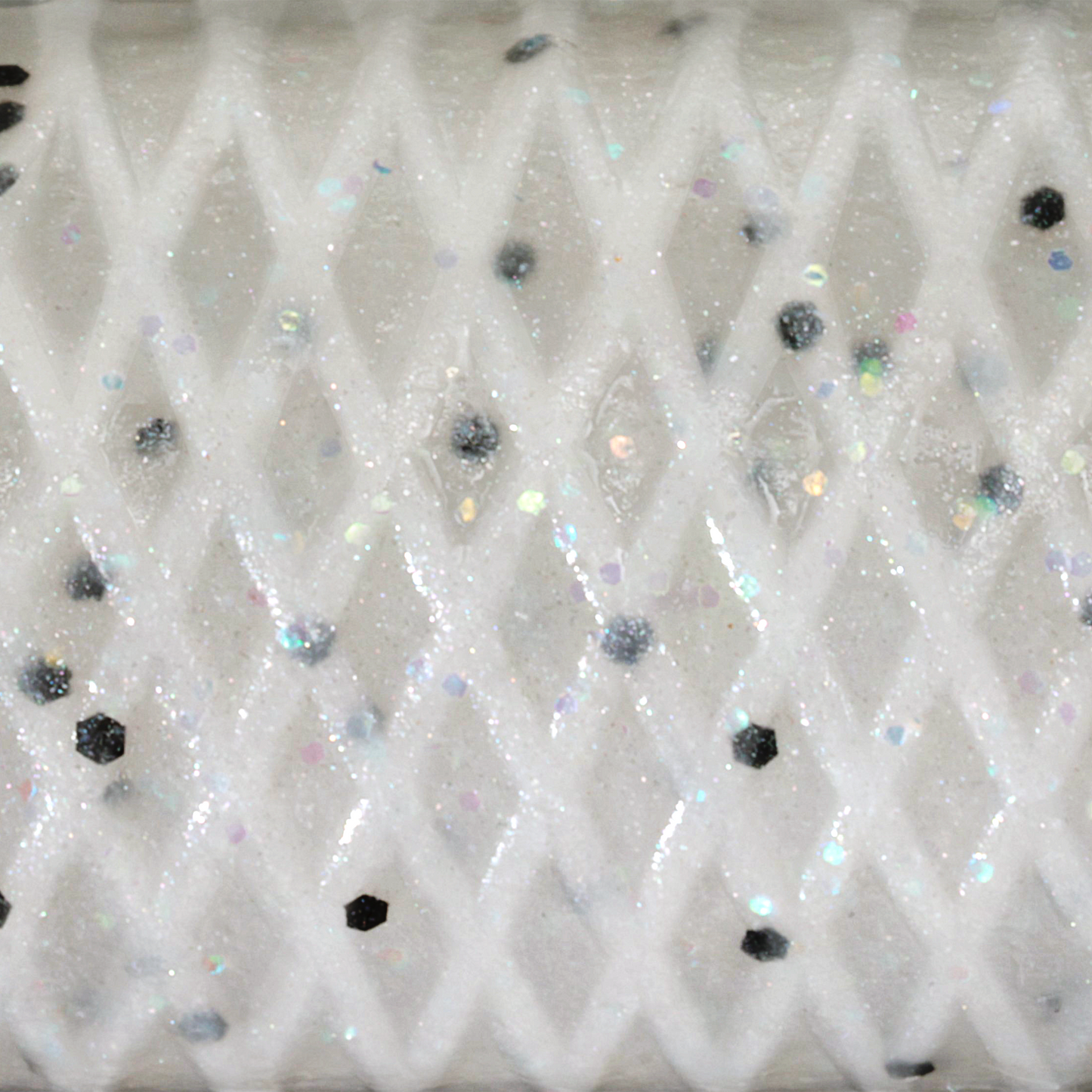 White mesh fabric with embedded black glitter and iridescent holographic flecks.